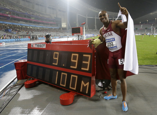 Qatar's Femi Ogunode stands by his race time after setting a games record in winning the men's 100 meters final at the 17th Asian Games in Incheon, South Korea, Sunday, Sept. 28, 2014. (AP Photo/Lee Jin-man)